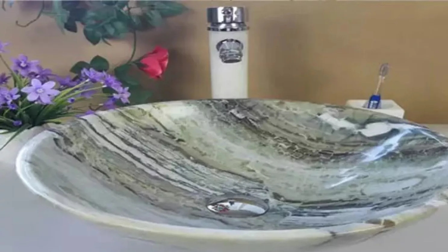 What is the difference between stone and ceramic sinks?