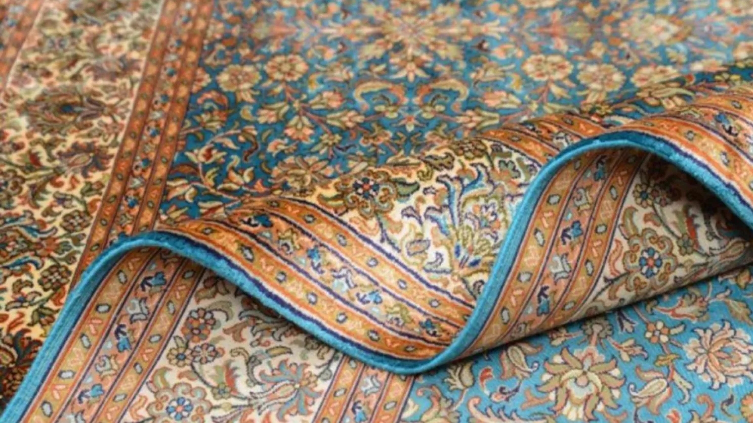 Removing stains from silk carpets