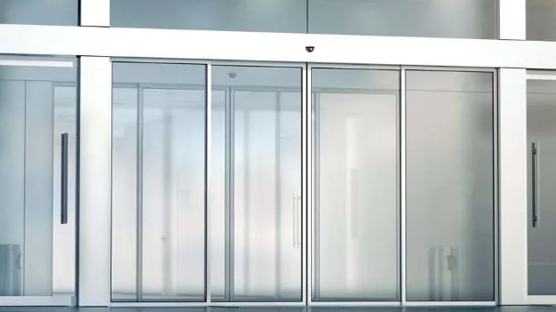 What are the advantages of using tempered glass for doors?