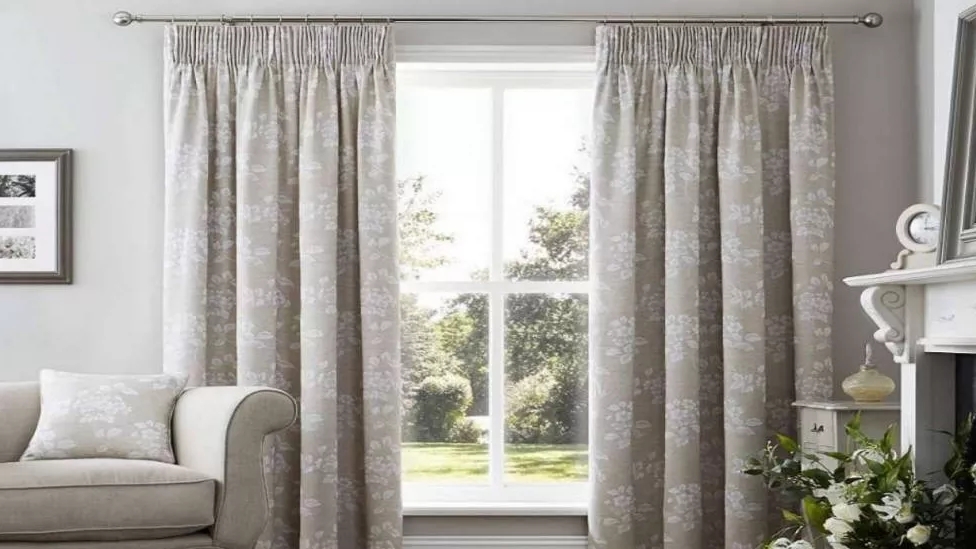 What is linen fabric and what are the advantages of using it in curtains?