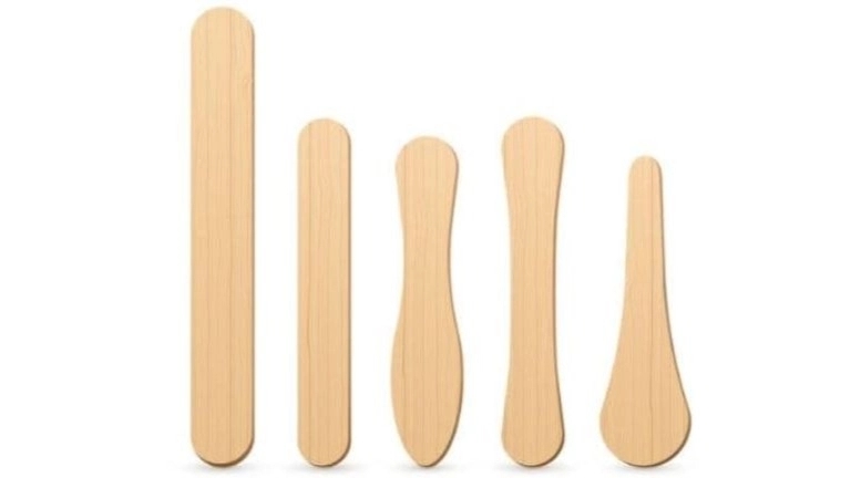 What is Abslang and what is the function of throat examination stick?