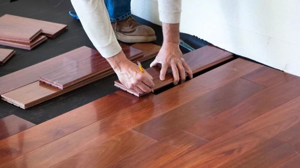 What is the difference between parquet and laminate and which one is better?