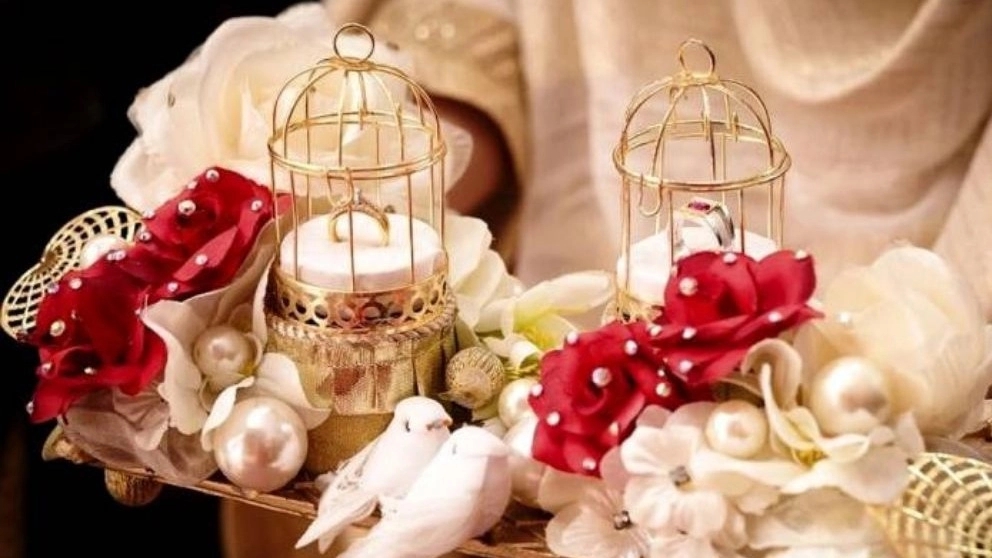 What items are placed on the wedding table and what is the philosophy of each one?