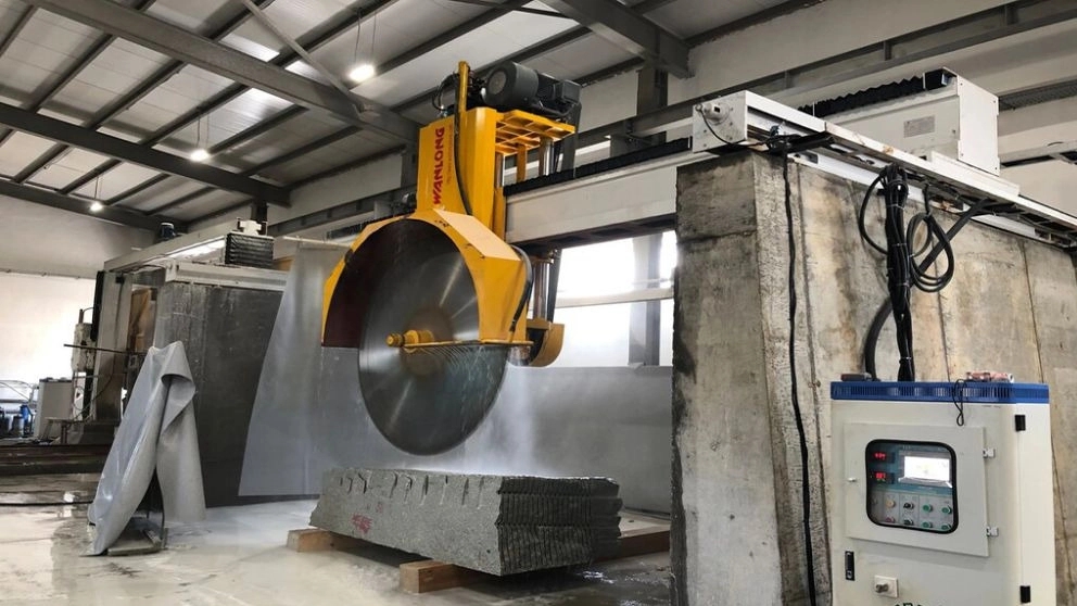 What is a stone cutting machine and what are its uses?