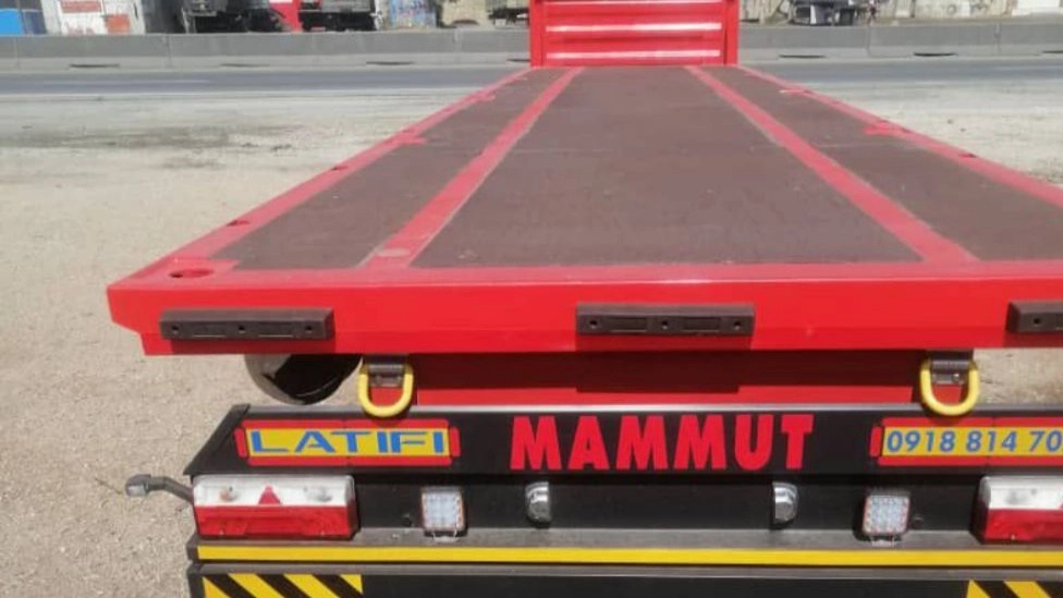 Application of flatbed trailer for carrying cargo