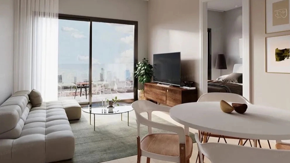 Arrangement of sofa and dining table in rectangular reception