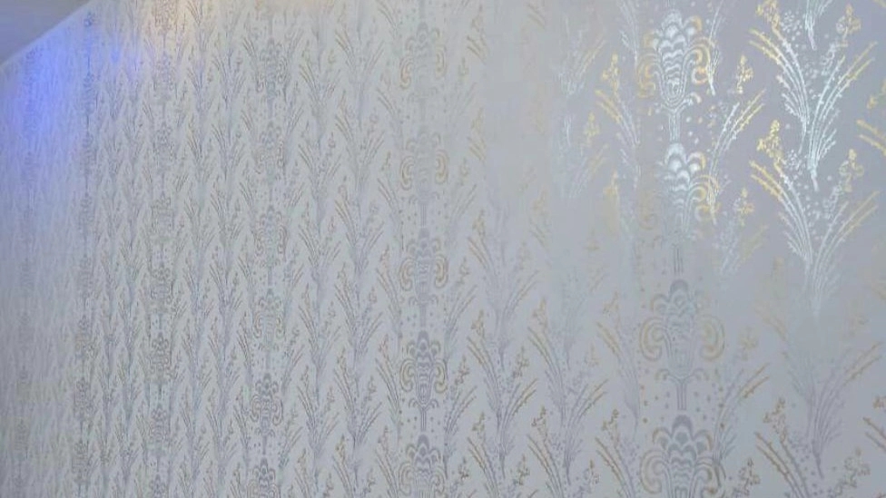 Comparison of wallpaper and paint