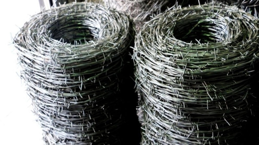 What is linear barbed wire and how is it different from circular barbed wire?