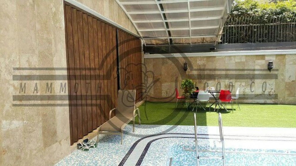 Movable partition of the wall and door of the Mammoth accordion concert hall in Tehran
