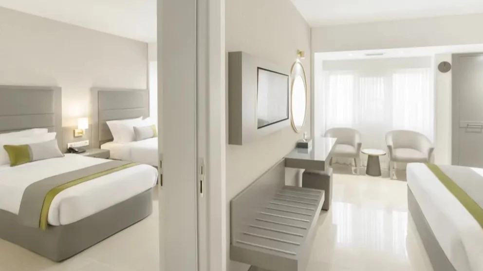 Why should we choose to stay in an apartment hotel instead of a hotel?