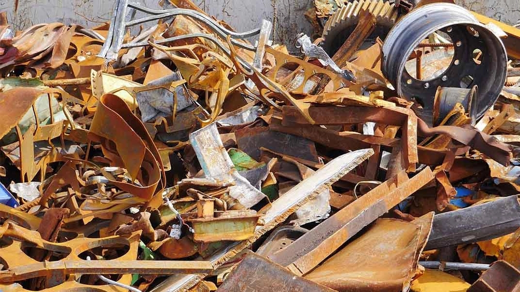 What are the advantages of recycling iron and zinc waste and how are they recycled?