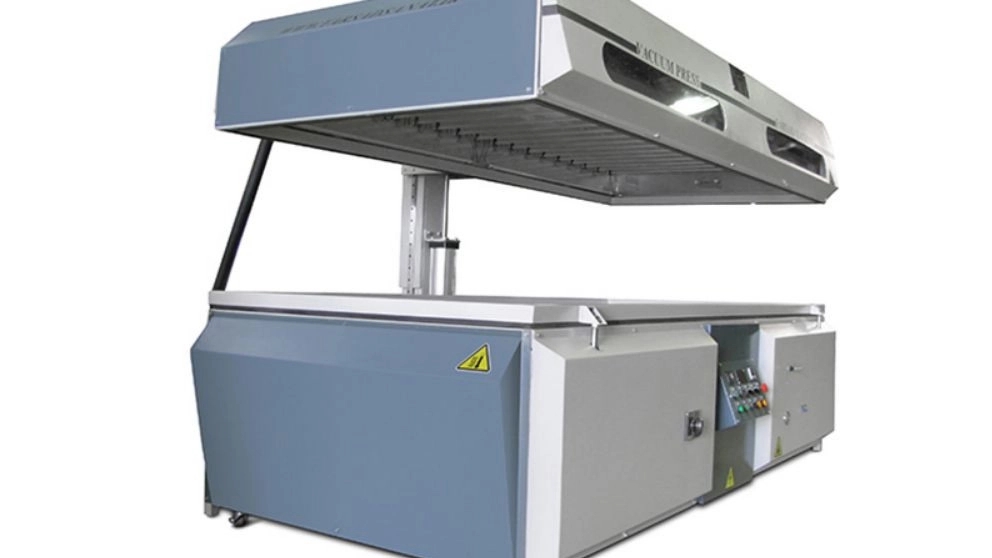 What is a vacuum press machine?
