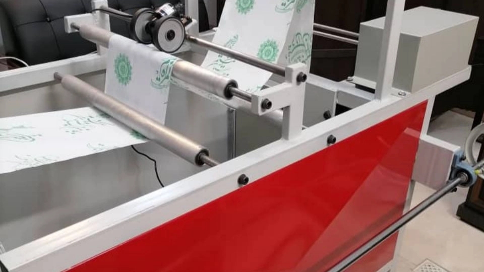 Manufacture of industrial machinery for rolling disposable tablecloths by Mehyar Sanat Tehran in Tehran