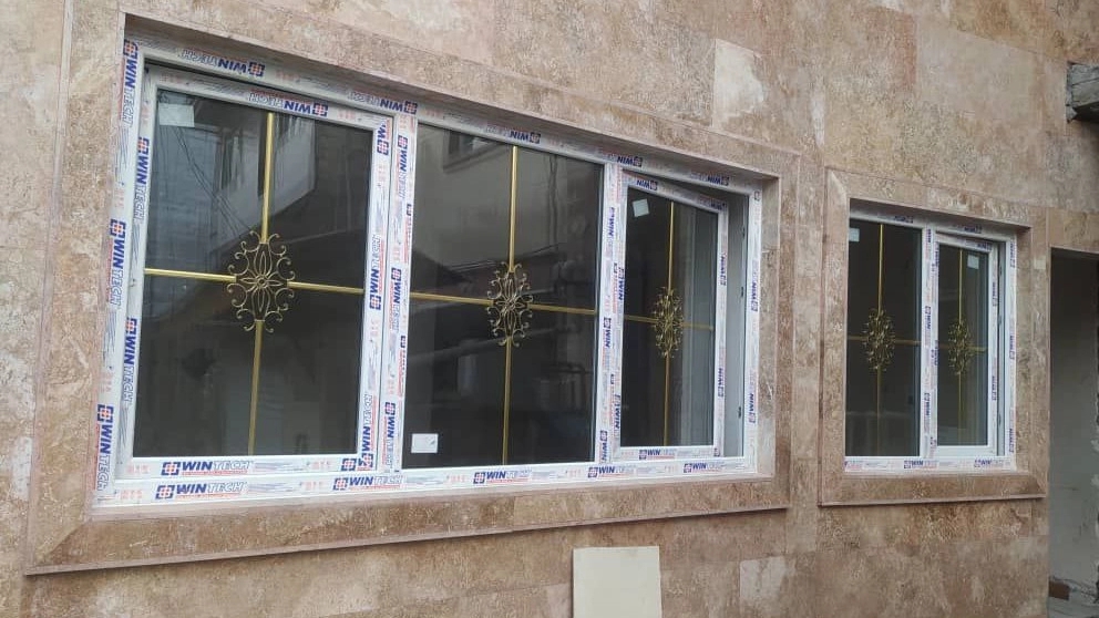 Maghsoudi UPVC double-glazed windows, production and sale of pleated glass balcony doors and windows in Melash Gilan