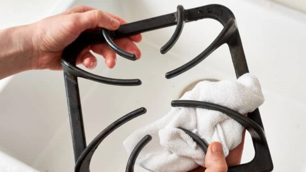 How is cast iron fat removed?