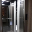 Asmon Burj Novin, design and installation of an escalator lift in Tehran