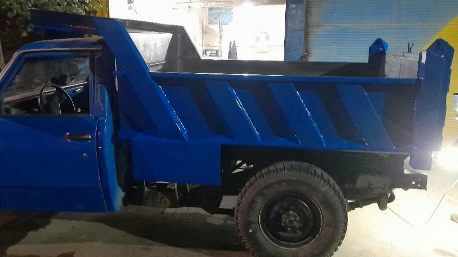 Old blacksmith, manufacture and installation of Nissan Khavar dump jack in Goldasht, Isfahan