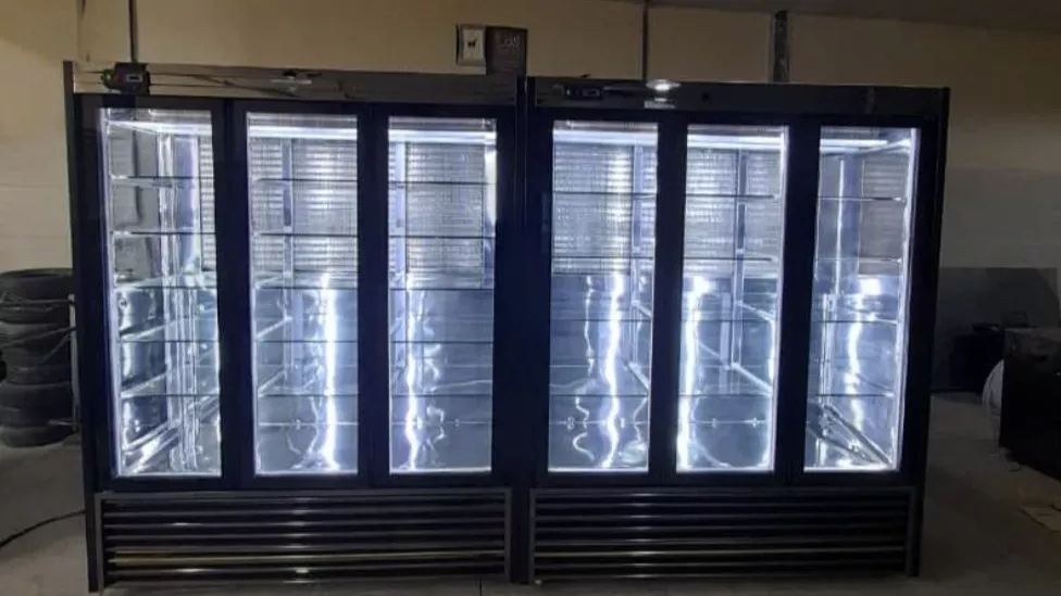 What is a showcase refrigerator and what is its use?