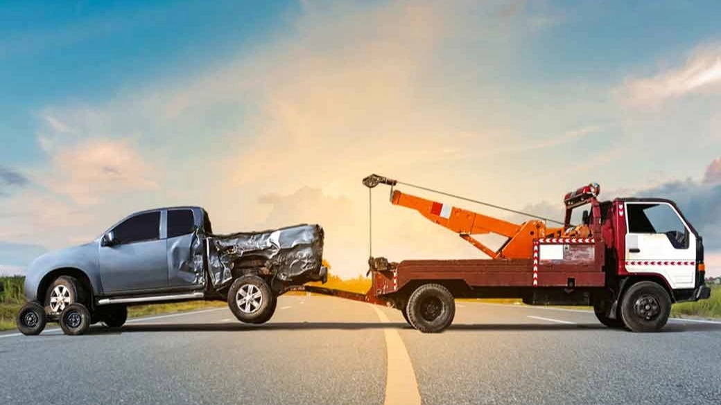 What is the difference between a car carrier and a tow truck?