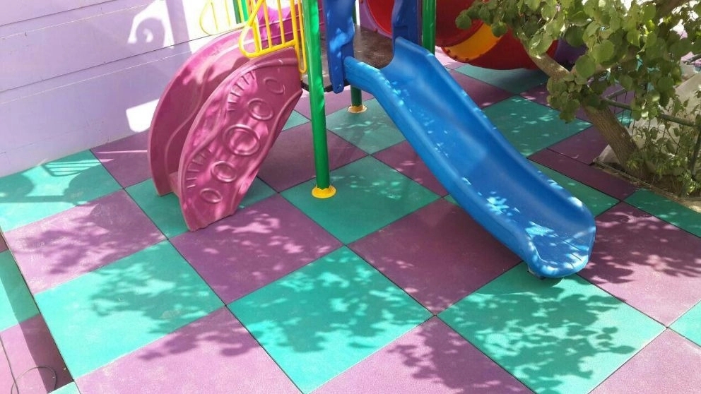 Graphom, production of granular tatami flooring and artificial grass in Tabriz
