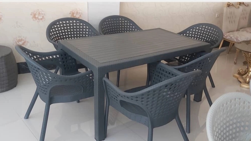 Distribution of plastic tables and chairs by Nasser Vilaei