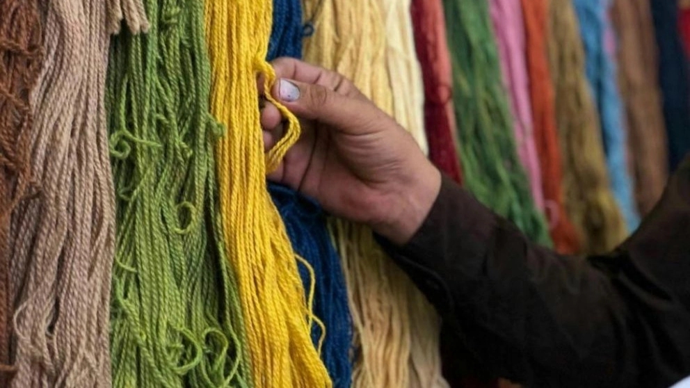 What is fabric finishing and how is it done?