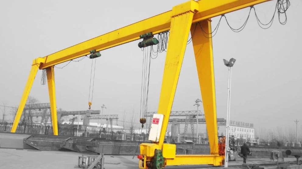 What is a gantry crane and what are its uses?