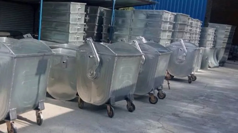 Large iron trash can