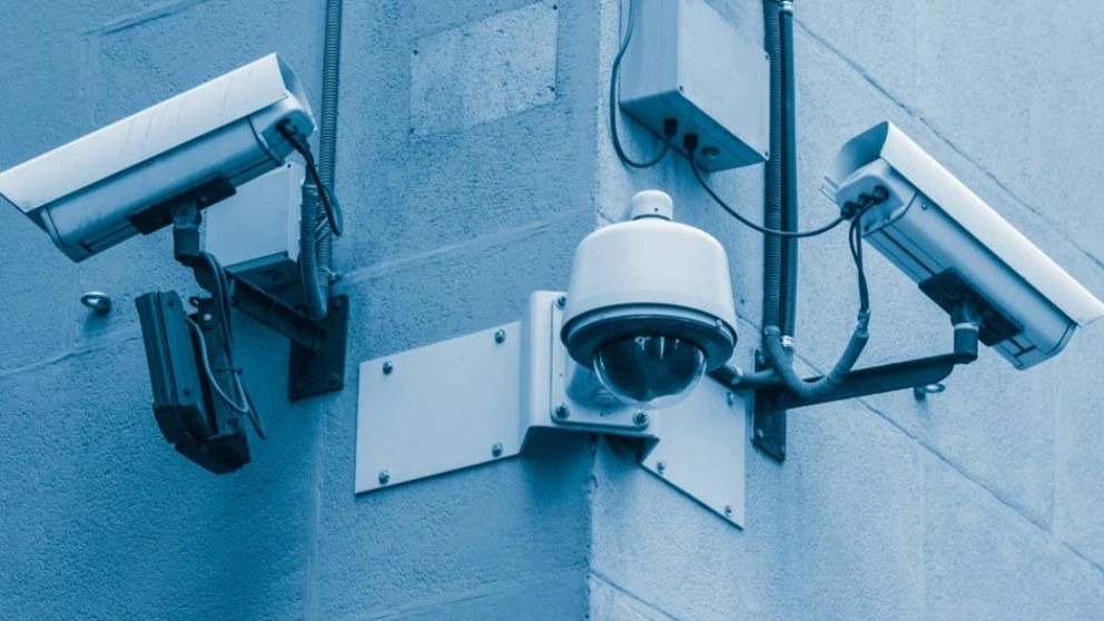 Is it more necessary to buy a camera or a burglar alarm?