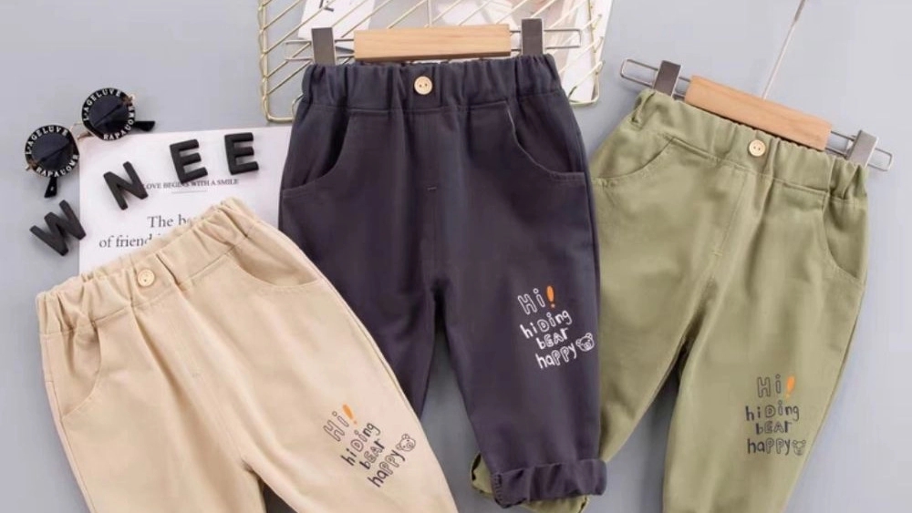 Little Hadith clothing, production and distribution of all kinds of children's trousers, coats and black chadors in Qazvin