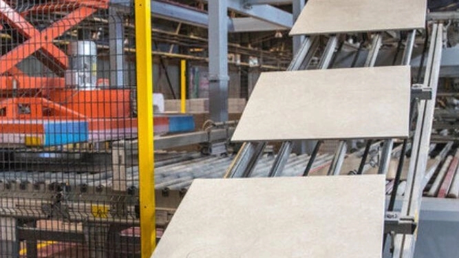 Making machines for the production of ceramic tiles
