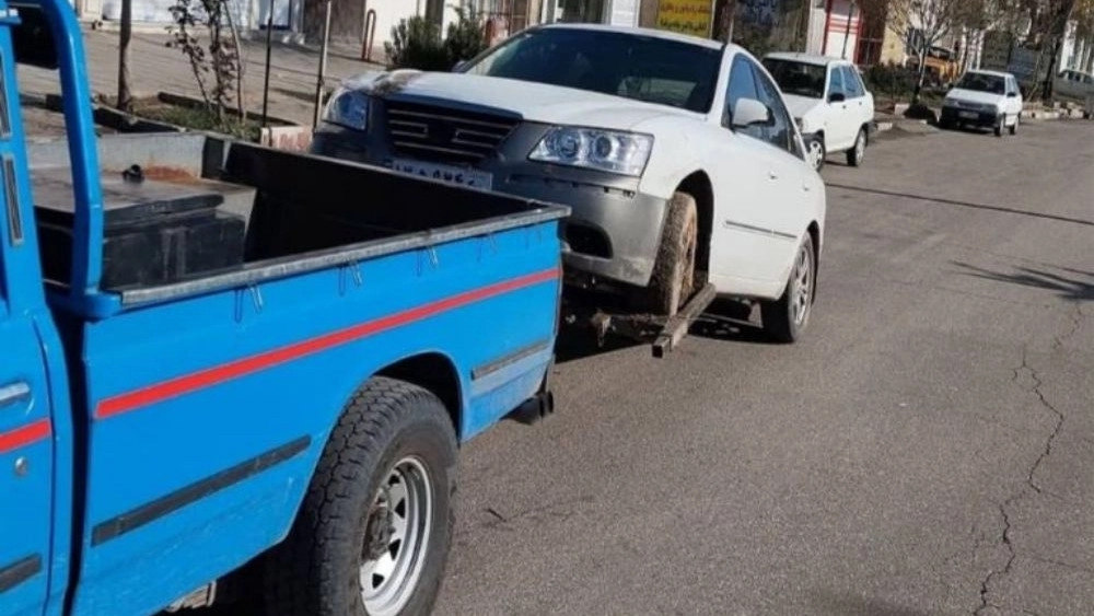 Car with Parsa Hamedan car carrier and tow truck