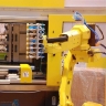 Pars Gostar Robotics Company, manufacture of plastic injection robot and cartrain in Tehran