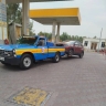 Gholam Hosseini's car rescue, the car is towed by a crane and a wheelbarrow in Kashan