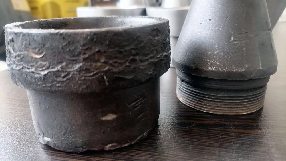 Nozzle for the production of electric wires