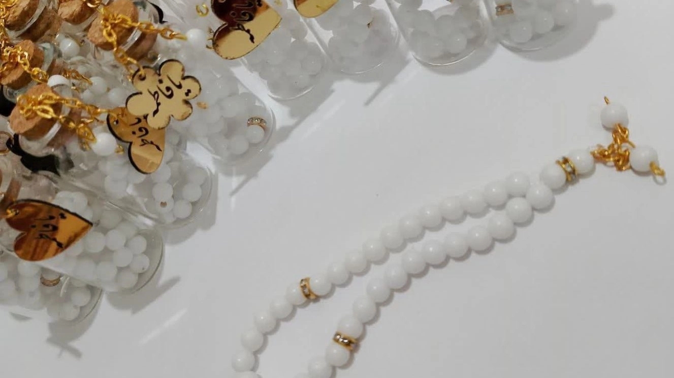 Gift Production, Sales and Distribution of Types of Rosary and Fit in Mashhad