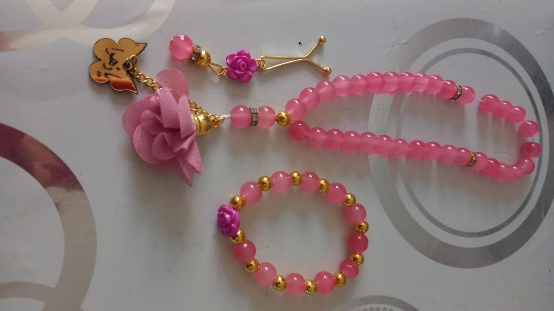 Sale of rosaries produced by the gift house