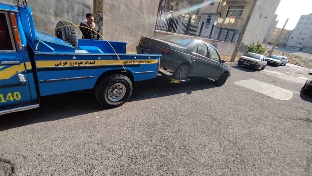 Ezzati car relief, towel and car in Tabriz