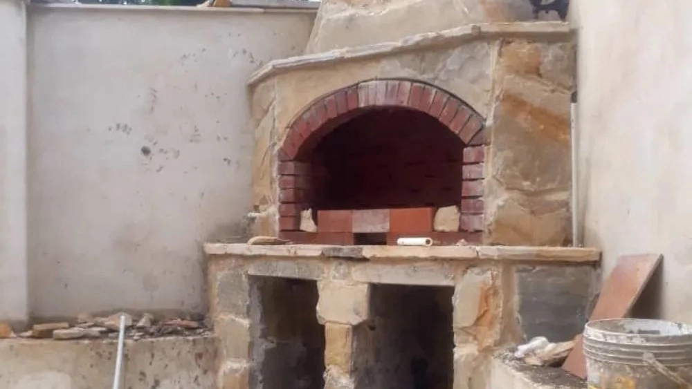 Installation of a fireplace and barbecue brick in Lahijan