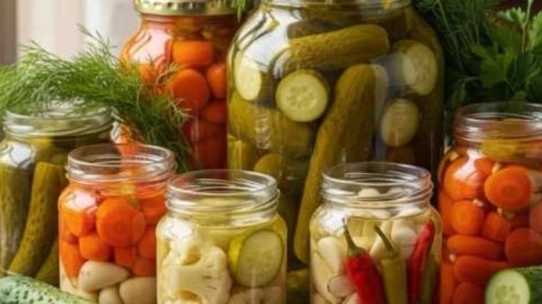 دستگاه بسته بندی ترشیجات و خیارشور شرکت آدان صنعت