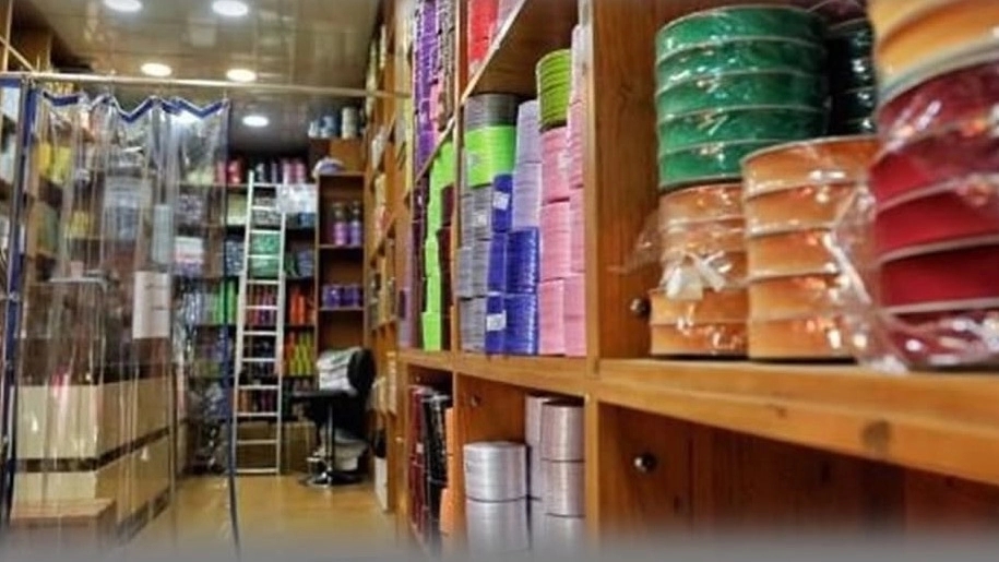 Chi button store, production and sale of clothing accessories and buttons in Tehran