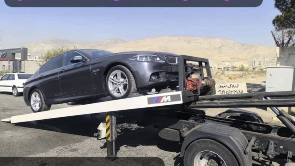 Kafi Sadr truck driver and round-the-clock car tow truck