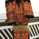 Zai Astin Naroi, designing and sewing traditional women's clothes in Zahedan