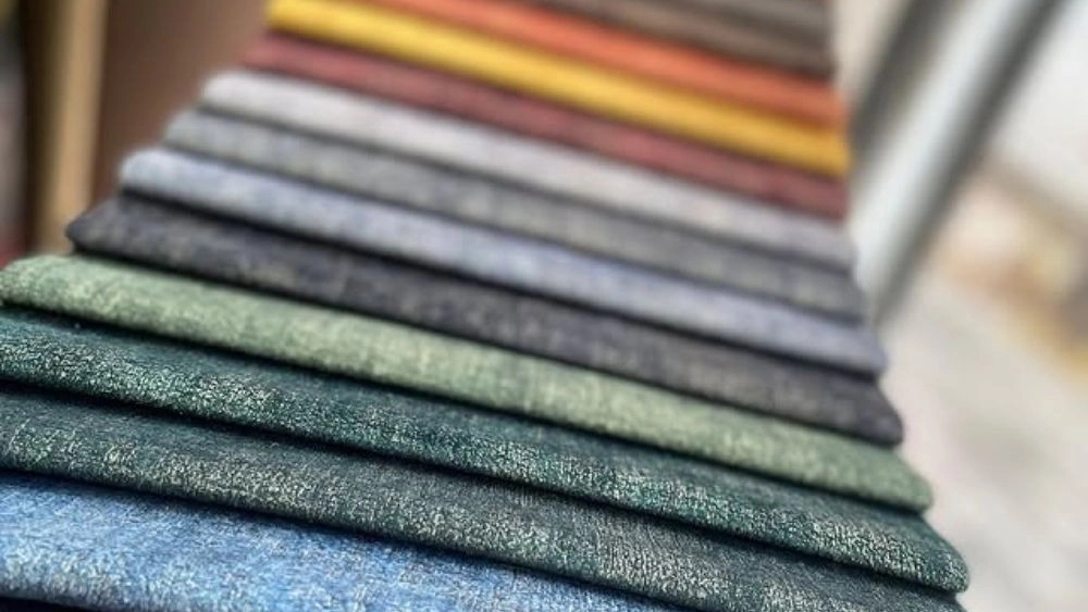 Rombli Ehsani, selling sofa fabric and curtains in Khoi
