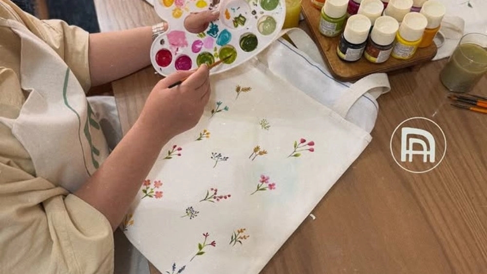 Fatemeh Janabi, designer and teacher of fabric painting in Lahijan