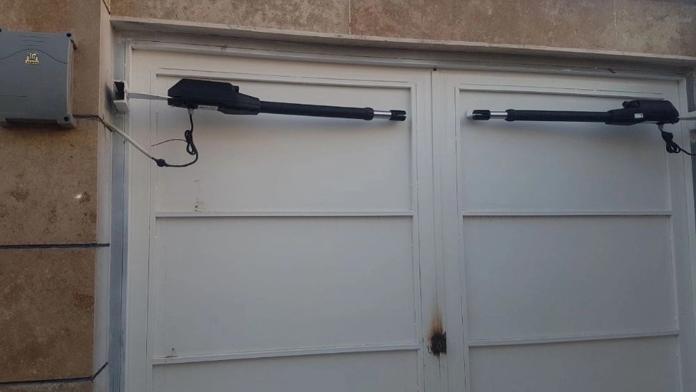 Technical services of Farad Engineering, sales and installation of automatic doors and burglar alarms in Qazvin