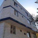 Working at the height of Qoms, washing the facade and installing signs in Semnan