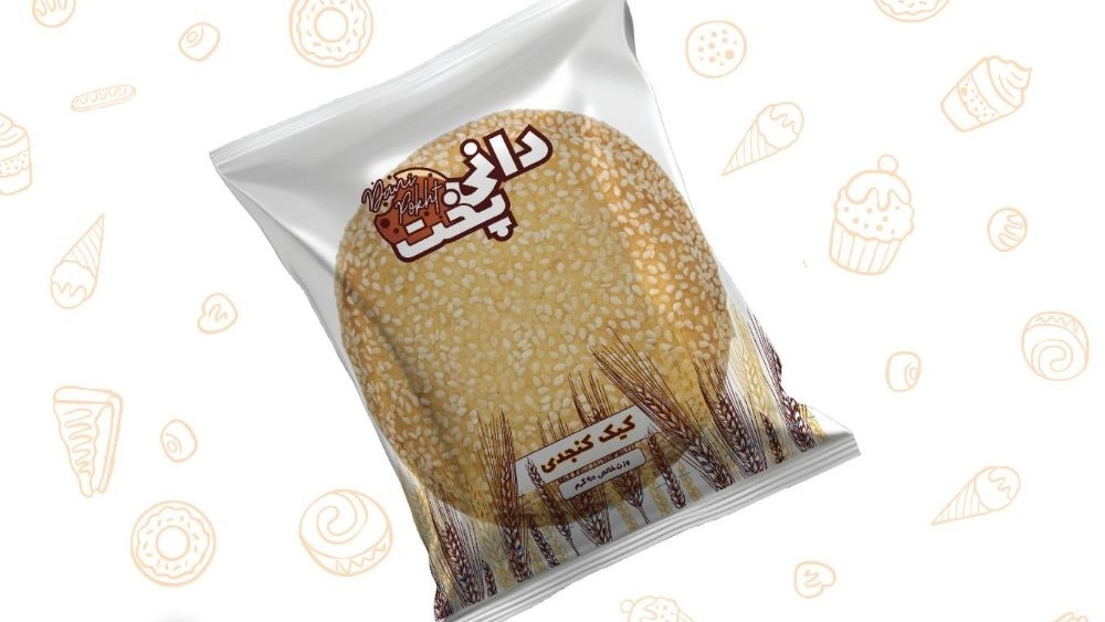 بيع وتوزيع كعكة دوني بخت بالسمسم في يزد