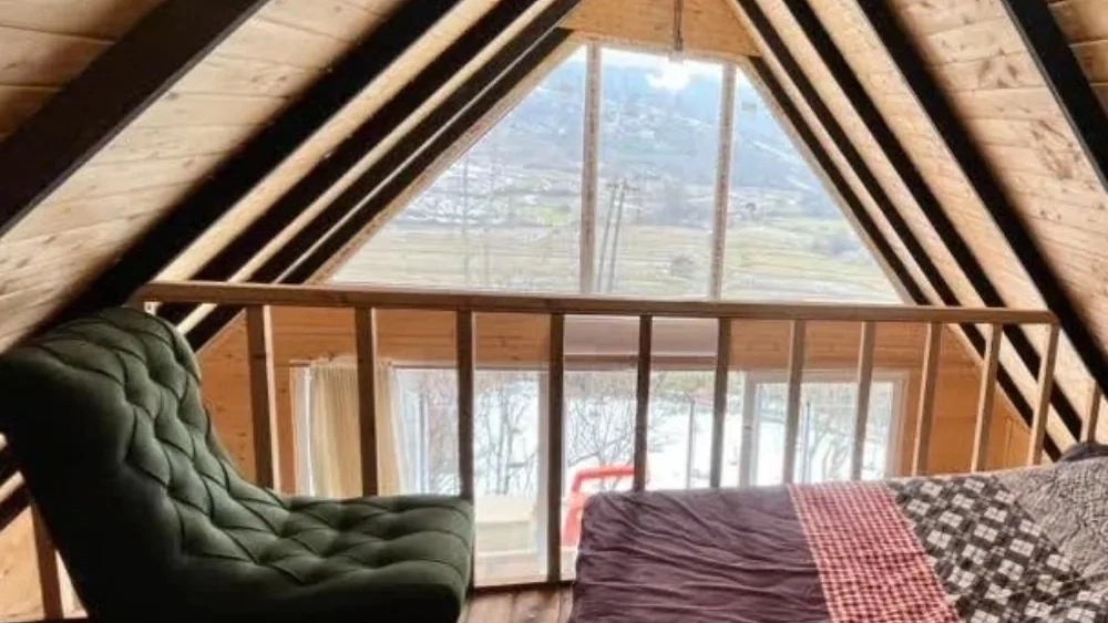 A Swiss wooden cottage in the heart of the lush forests of Swadkoh, Mazandaran