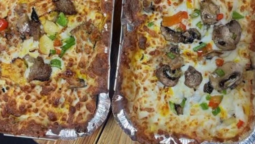 Bomb fast food, serving half-meter sandwiches, pizza and burgers in Rasht